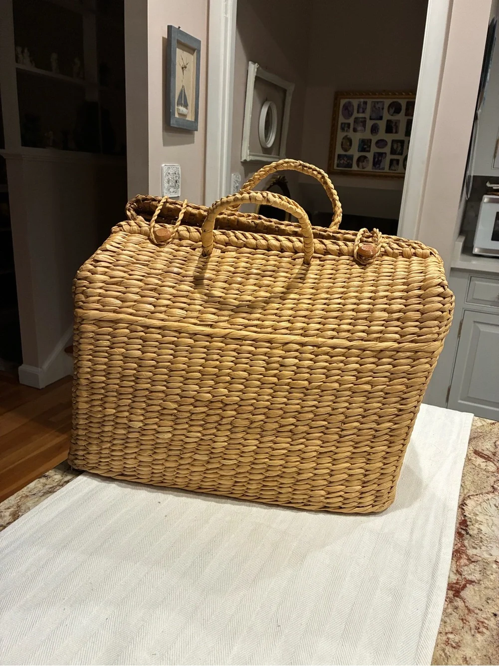 Vintage natural water hyacinth and reed structured picnic basket